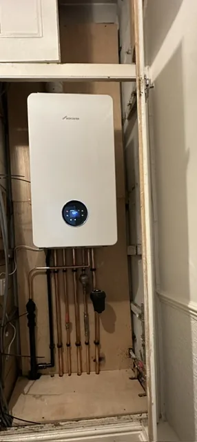 Second combi boiler installation with new gas run and controls