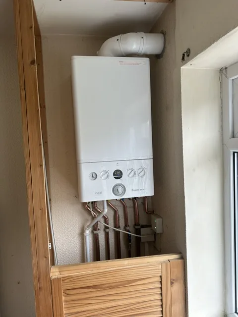 System boiler and new pipework installed in a family home