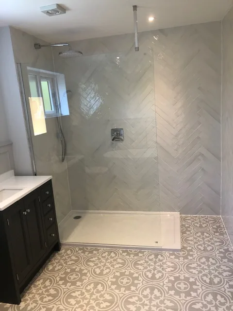 Third bathroom project featuring a walk-in shower enclosure