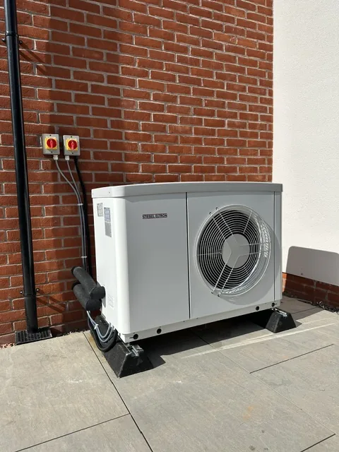 Second view of the heat pump external unit and pipework routing